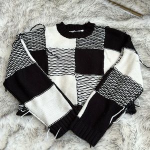 Ragged priest sweater